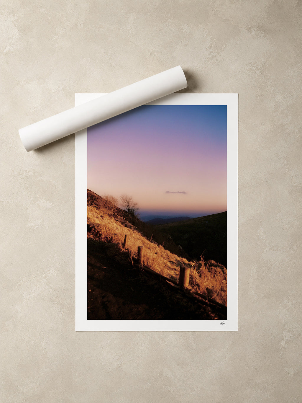 Winter dusk over the Chaîne des Puys, Auvergne, France — unframed fine art print lying flat beside a rolled print