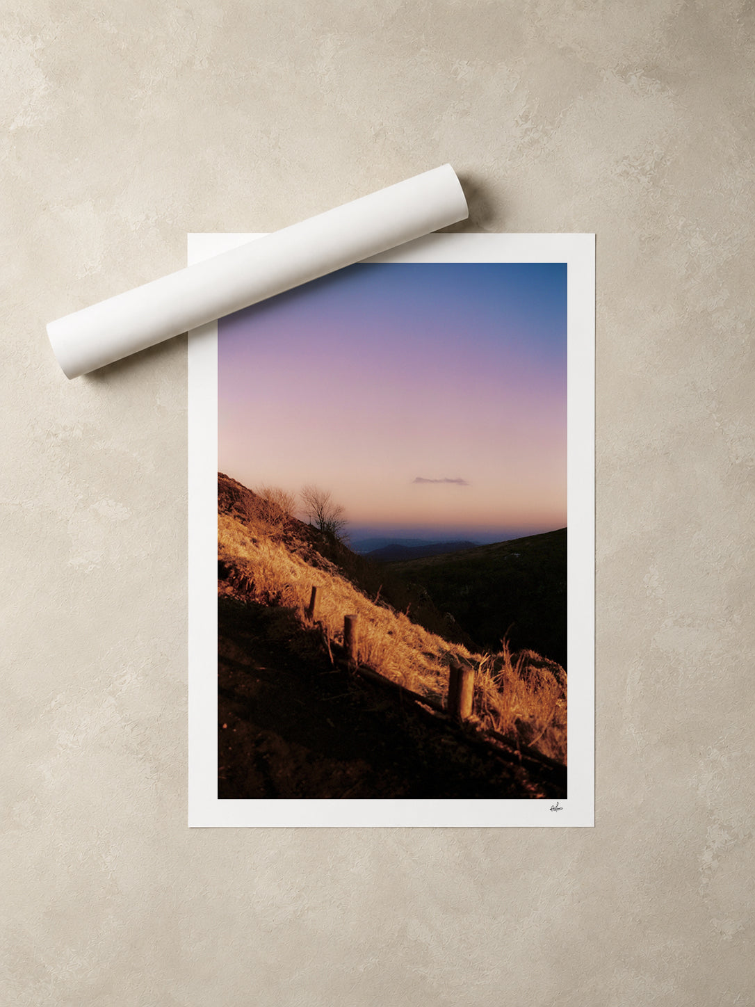 Winter dusk over the Chaîne des Puys, Auvergne, France — unframed fine art print lying flat beside a rolled print