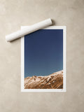 Snow-streaked ridges under a deep blue sky, French Alps, France — unframed fine art print lying flat beside a rolled print