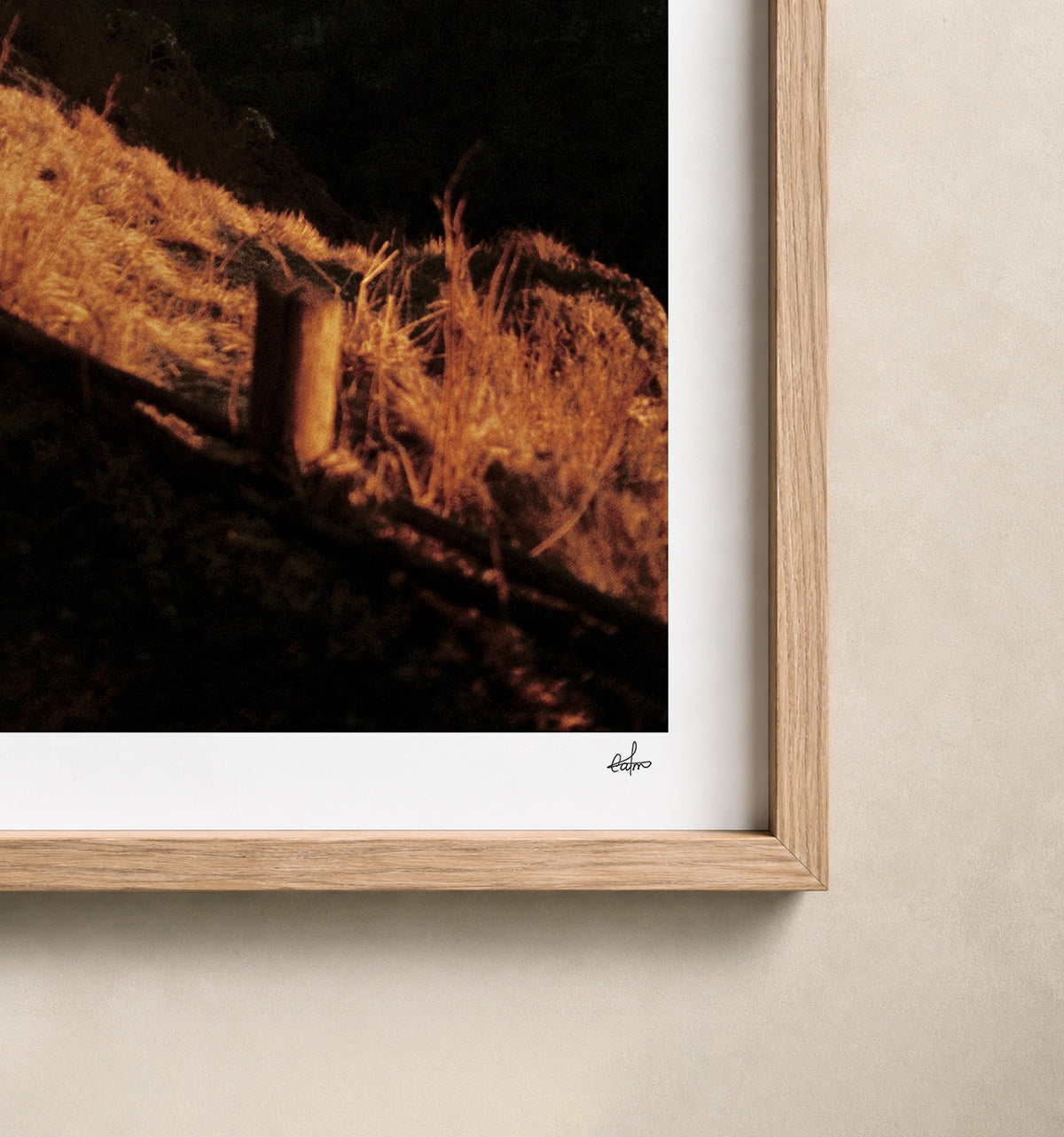 Winter dusk over the Chaîne des Puys, Auvergne, France — close-up of the print's white border and oak frame