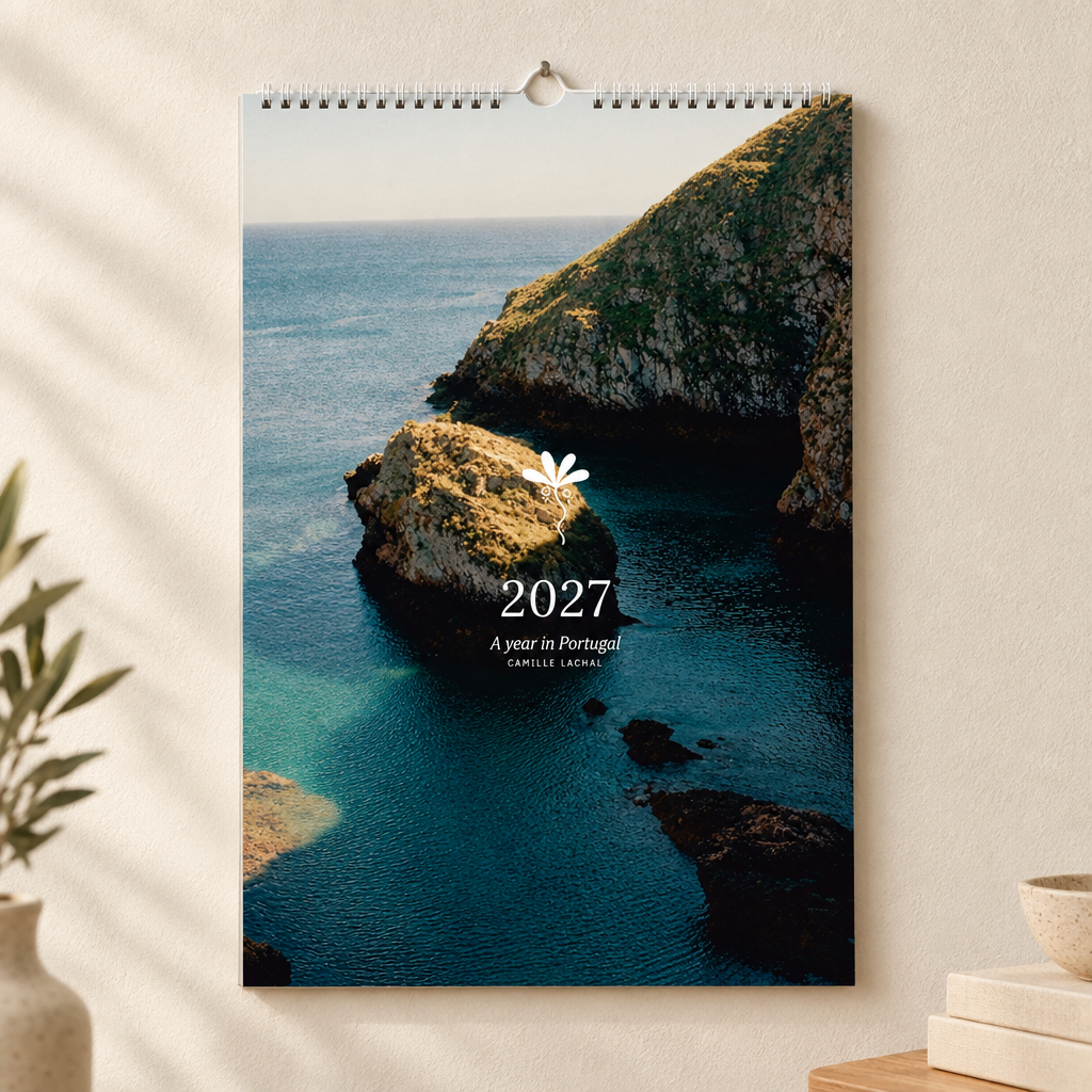 2027 Portugal wall calendar, A4, wire-bound with hanging hook — cover mockup, analog film photography of Lisbon and the Portuguese coast