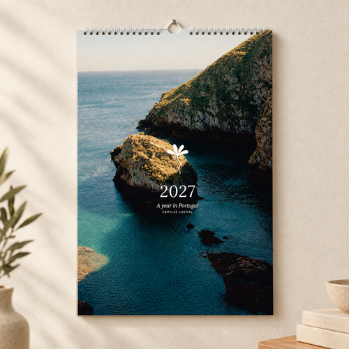 2027 Portugal wall calendar, A4, wire-bound with hanging hook — cover mockup, analog film photography of Lisbon and the Portuguese coast